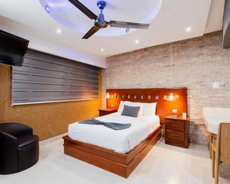 Hotel & Suites Country Valladolid - ויאדוליד - חדר שינה