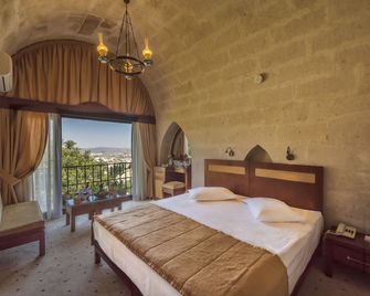 Uchisar Kaya Otel - Uchisar - Bedroom