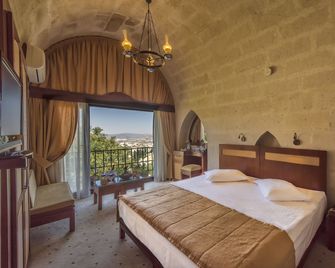 Uchisar Kaya Otel - Uchisar - Sovrum