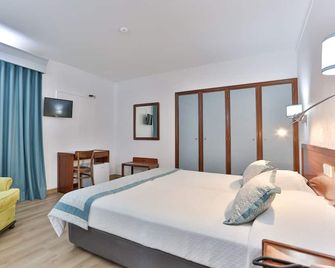 Hotel Arangues - Setúbal - Chambre