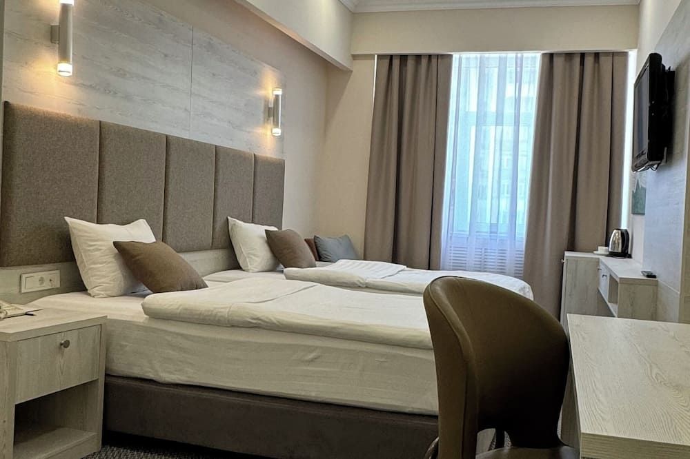 جراند أوتيل أوراسيا - ألماتي - غرفة نوم