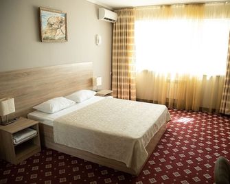 Silk Way Hotel - Aqtau - Schlafzimmer