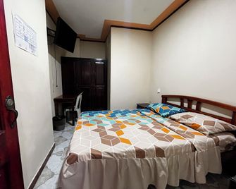 Hostal Amazónico Bello Amanecer - Nueva Loja - Bedroom