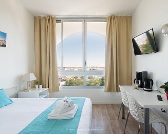 ريزيدانس نيو راشيل - لاروشيل - غرفة نوم