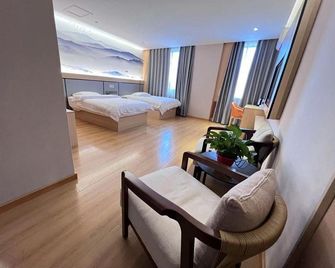 Harbin Rice Business Hotel - Harbin - Bedroom