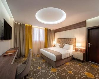 Ahad Rafidah Garden Millennium Hotel - Al Maraghah - Habitación