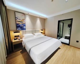 Greentree Inn Henan Shangqiu Sui County Suizhou Avenue Beihu Business Hotel - Shangqiu - Bedroom