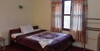 Hotel Park Inn - Sauraha - Bedroom