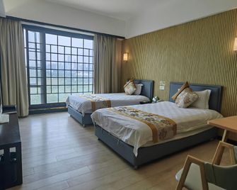 Yinghua Xiaozhu Hotel (Guangzhou Pazhou Convention & Exhibition Haizhu Wetland Park Branch) - Κουανγκτσόου - Κρεβατοκάμαρα