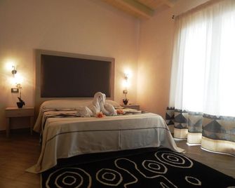 Hotel Il Platano - סן תאודורו - חדר שינה