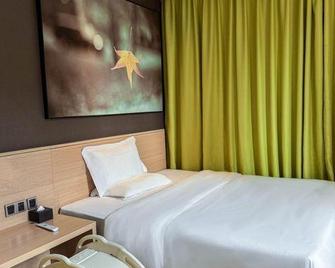 Iu Hotel Guangzhou Sports Center Lin He - Guangzhou - Bedroom