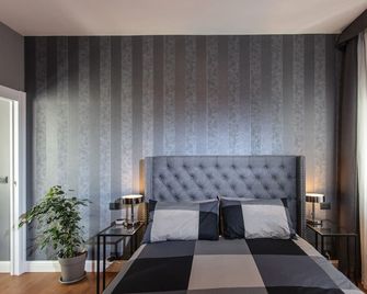 Kero Luxury Rooms - كاغلياري - غرفة نوم