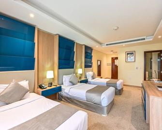 Al Mansour Suites Hotel - Doha - Bedroom