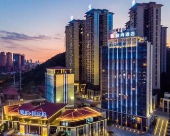 Echarm Hotel Guiyang Huaxi University Town Meidi Guobinfu - Guiyang - Building