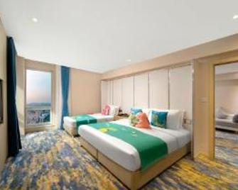 Wanda Holiday Hotel (Harbin Central Avenue) - هاربين - غرفة نوم