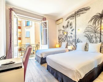 Hotel Les Palmiers - סנט מקסים - חדר שינה