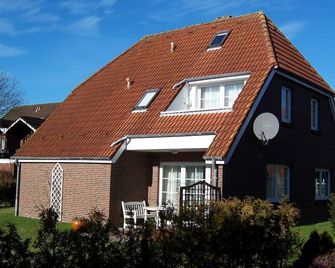 Upper floor - apartments Uferstrasse - Carolinensiel - Gebäude