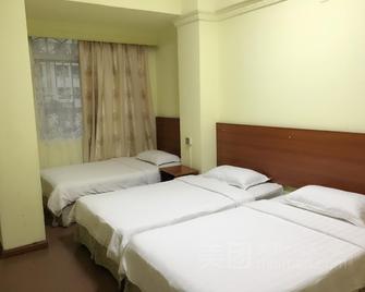 Wanli Hotel - שנג'ן - חדר שינה