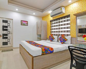فاب هوتل راجدهاني ريزيدنسي - رانتشي - غرفة نوم