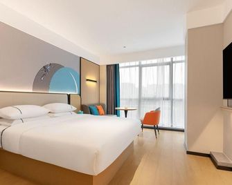City Comfort Inn Hotel (Xianning Hubei Kejixueyuan) - Xianning - Bedroom