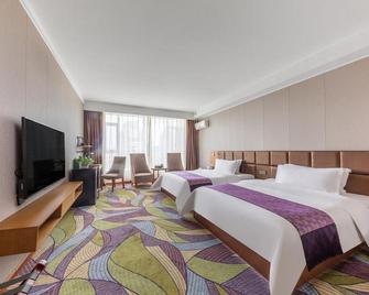 Bojingwan Business Hotel (Baotou Minzu East Road) - Baotou - Slaapkamer