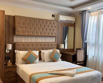Grand Yak Boutique Hotel - קטמאנדו - חדר שינה