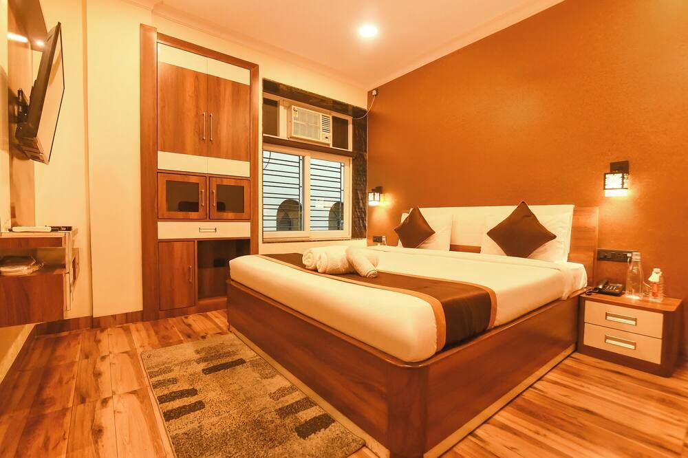 Fabhotel Prime Tiyara Inn - כלכולתה - חדר שינה