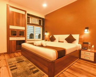 Fabhotel Prime Tiyara Inn - Колката - Спальня