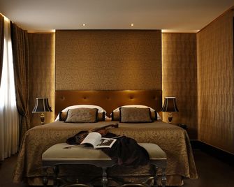 أكوا بالاس - البندقية - غرفة نوم