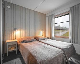 Hotel Rukatonttu - Kuusamo - Schlafzimmer