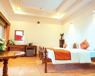 Krishna Beach Resort Kannur - Kannur - Спальня