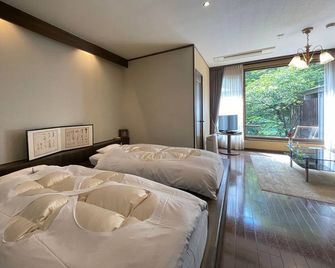 Miyakowasure Natsuse Onsen - Semboku - Camera da letto