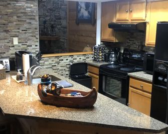 Escape To The Mountains, Best Spring Skiing In Years - Champion - Kitchen