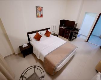 Al Marjan Furnished Apartments - Ajman - Makuuhuone