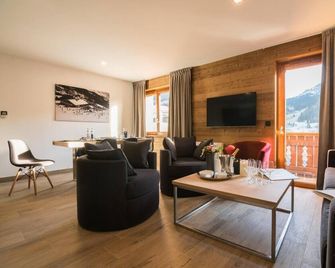 Chalet, fitness, sauna, hammam, terrace, balcony, fireplace or stove, tv, 197-212m², Praz sur Arly - Praz-sur-Arly - Huiskamer