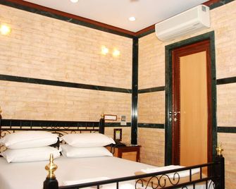 Hotel Hira - מומבאי - חדר שינה