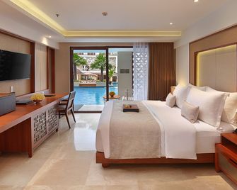 The Bandha Hotel & Suites - Kuta - Bedroom
