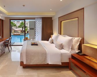 The Bandha Hotel & Suites - Kuta - Bedroom