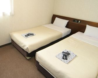 Business Hotel Yagi - Kitaakita - Habitación