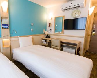 Toyoko Inn Biwako sen Minami Kusatsu eki Nishi guchi - Kusatsu - Schlafzimmer