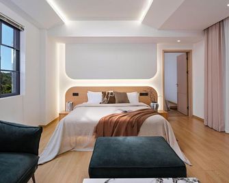 Grand Idea·Light Luxury Boutique B&B (Erhai Fantasyland Branch) - Dali - Sypialnia