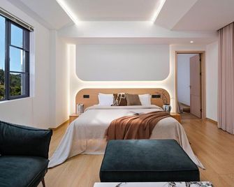 Grand Idea·Light Luxury Boutique B&B (Erhai Fantasyland Branch) - Dali - Sypialnia