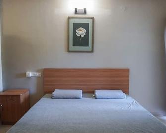 The Healing Hills Naturopathy & Wellness Centre - Coimbatore - Bedroom