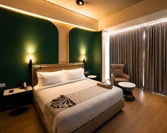 Hotel Natanya - Tanjavur - Schlafzimmer