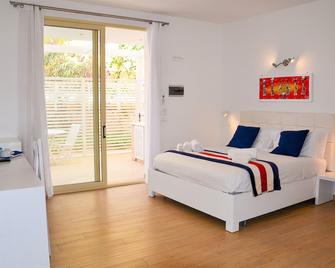 Branco Suites - Santa Maria - Dormitor