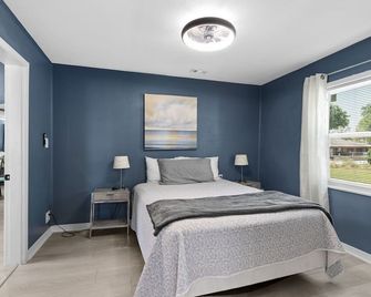 Relaxing Retreat with Game Room + Massage Chair+ Fire Pit + Wood Fire Pizza Oven - Dundee - Habitación