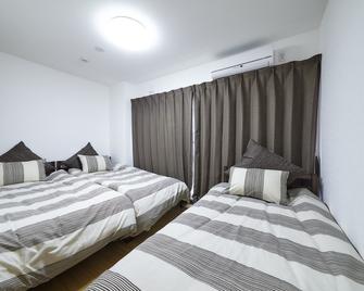 Oyado Kinokuniya Motoshikkui Machi - Nagasaki - Bedroom