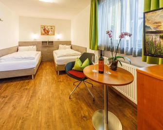 Hotel-Restaurant Bellevue - רופולדינג - חדר שינה