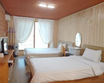 Starlight Oreum Pension - Ciudad de Jeju - Habitación
