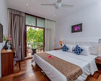 Sun Tan Beach Hotel - Maafushi - Bedroom